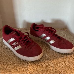 Red suede adidas tennis shoes
